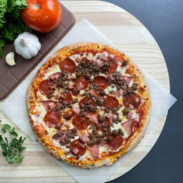 Indulge in Our Meat Pizza