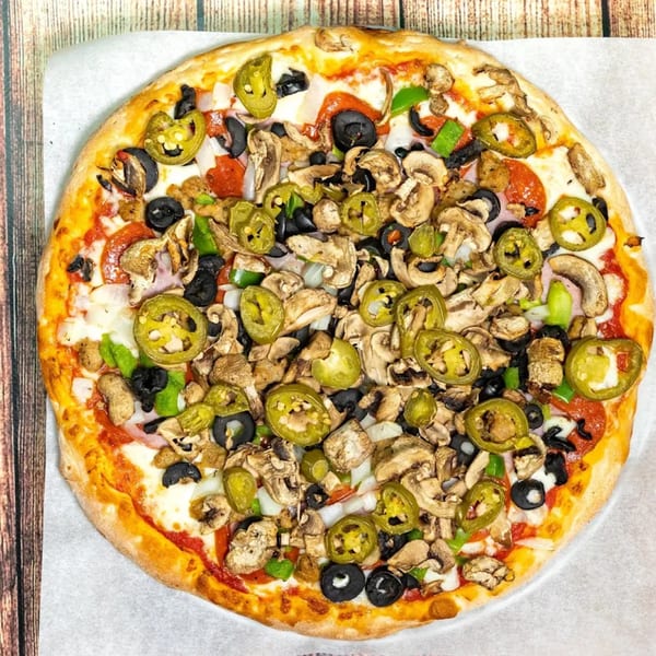 Big T's Pizza with pepperoni, mushrooms, black olives, onions, green peppers, and jalapeños.
