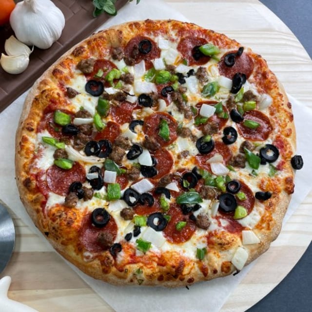 Big T's Deluxe Pizza.